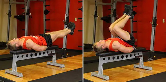 How to do the Flat Bench Leg Pull-In https://get-strong.fit/Flat-Bench-Leg-Pull-In-How-To-Exercise-Guide/Exercises